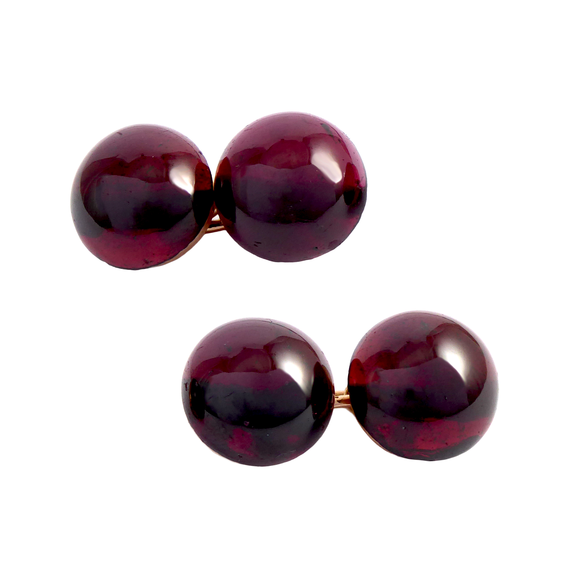 Pair of late 19th century round cabochon garnet and gold cufflinks, French c.1890,